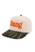 Pearl of the West hat in cream and camo with the word Dang in bright orange on front profile view