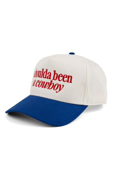 Pearl of the West snapback hat in cream and blue with the words shoulda been a cowboy in bold red on front profile view