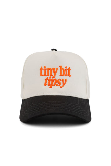 Pearl of the West snapback hat in cream and black with the words tiny bit tipsy in bright orange on front front view