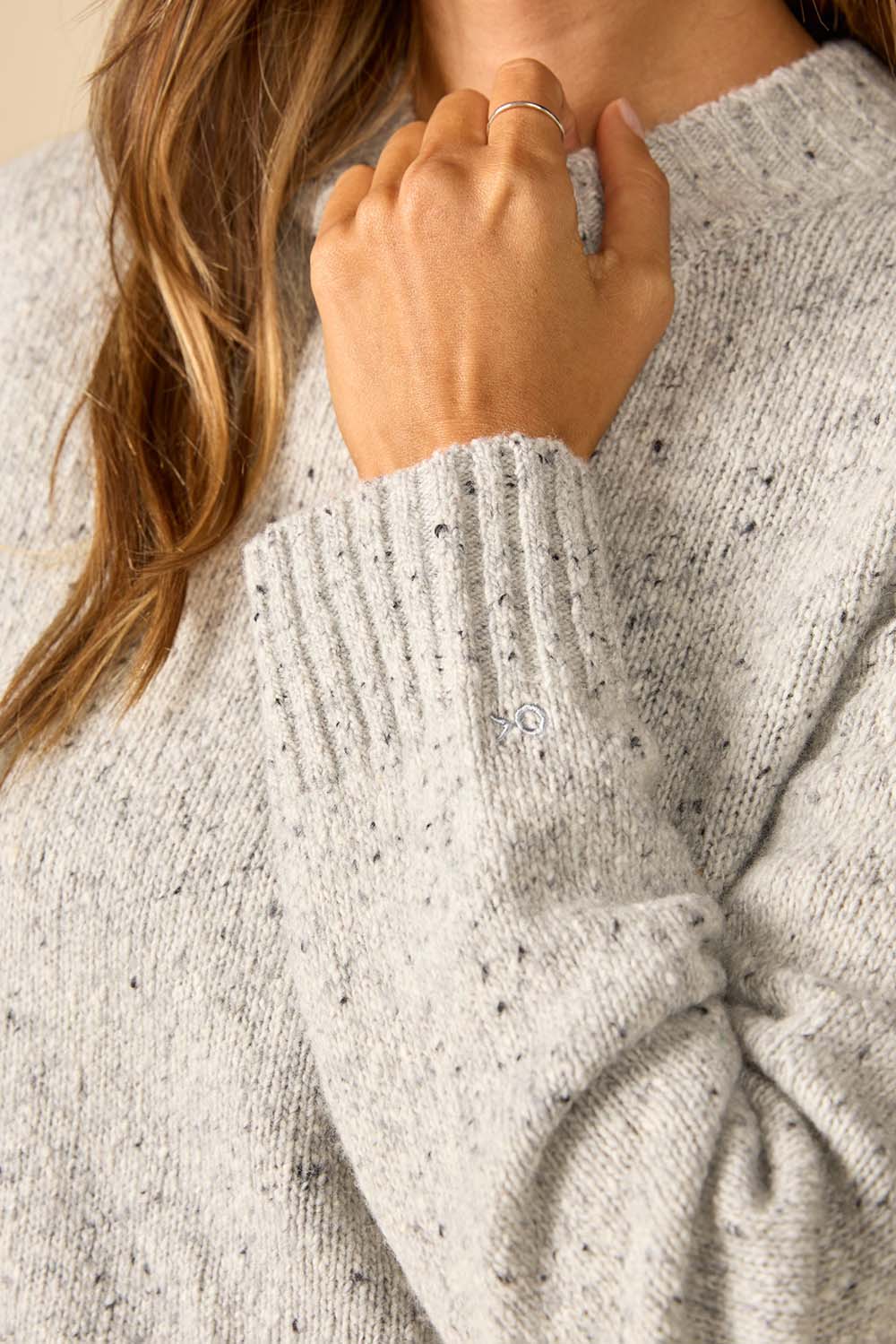 Outerknown Roma Donegal Sweater in Heather Grey — Sleeve detail view