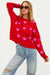 beach riot callie hearts sweater in royal red hearts profile view