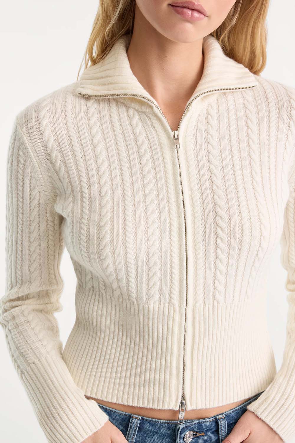 Good American The Cable Zip Up in Chalk — Zip detail view
