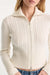 Good American The Cable Zip Up in Chalk — Zip detail view
