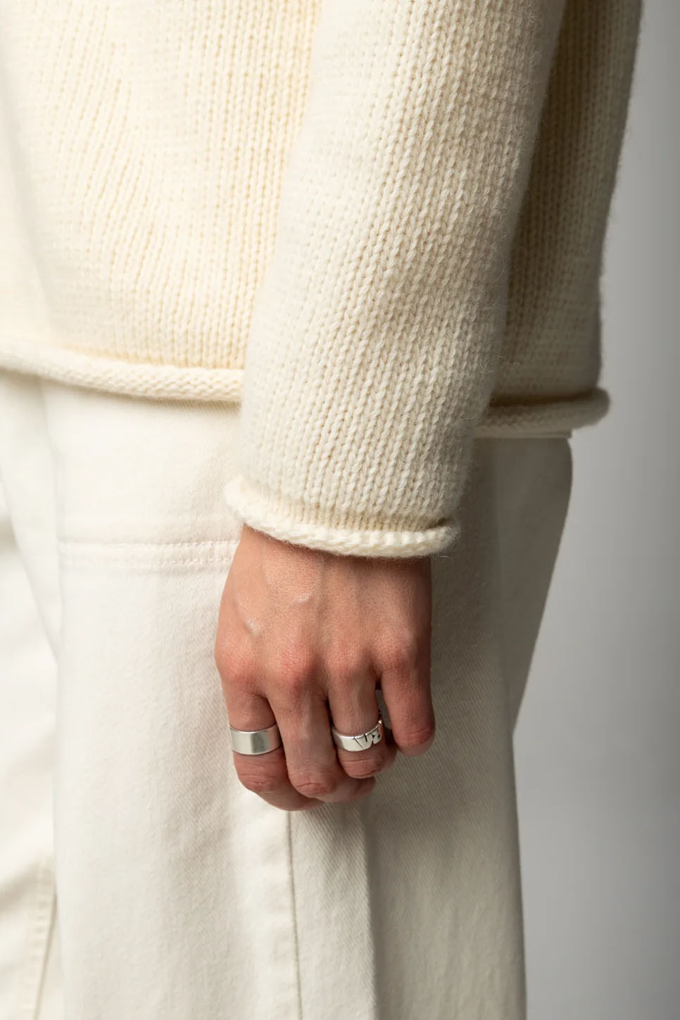 Finisterre Taran Jumper in Ecru — Cuff detail view