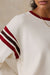 Faherty Sport Jersey Throwback Tee in Antique White Varsity — Sleeve detail view