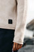 Finisterre Barents Jumper in Oatmeal — Label detail view