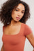 free people sunfade clean lines baby tee canyon sunset detail
