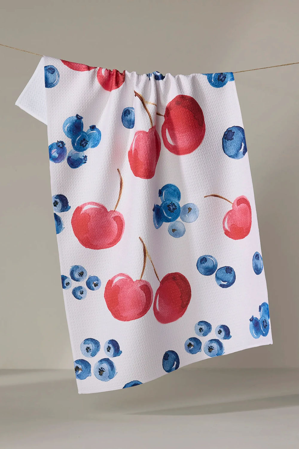 Geometry Cherry on Top Tea Towel — Styled view