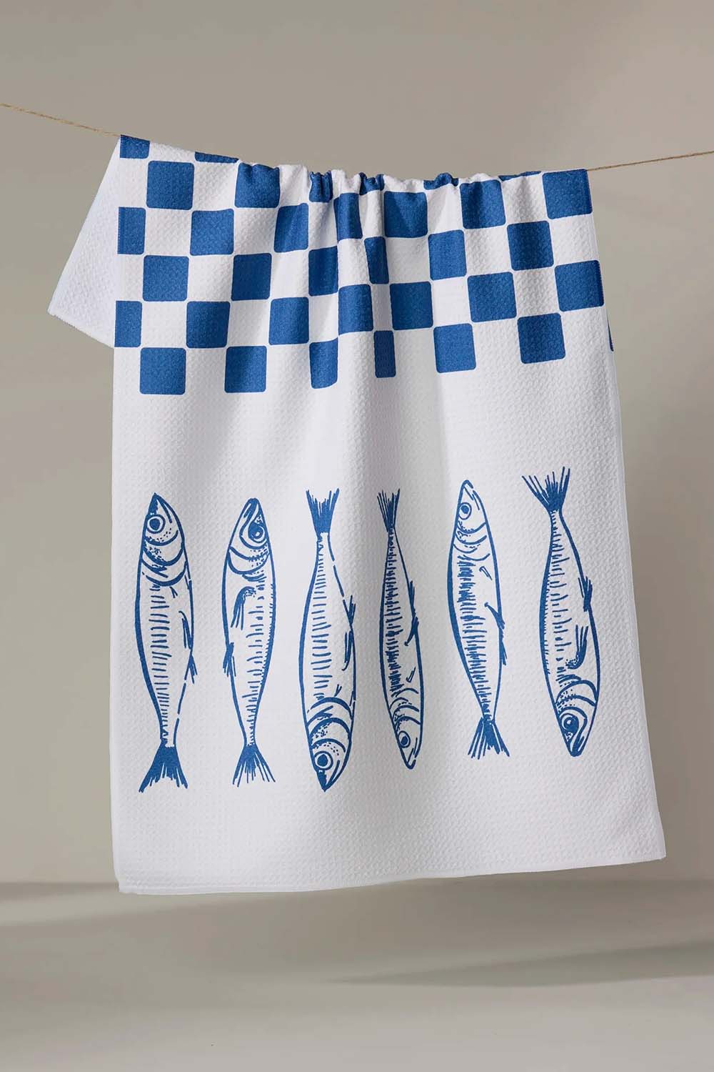 Geometry Sardine Check Blue Tea Towel — Styled view