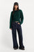 Good American The Chunky Knit Sweater in Forest Green — Styled view