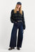 Good American Soft Tech Waist Palazzo Ankle Jeans in Rinse — Front view