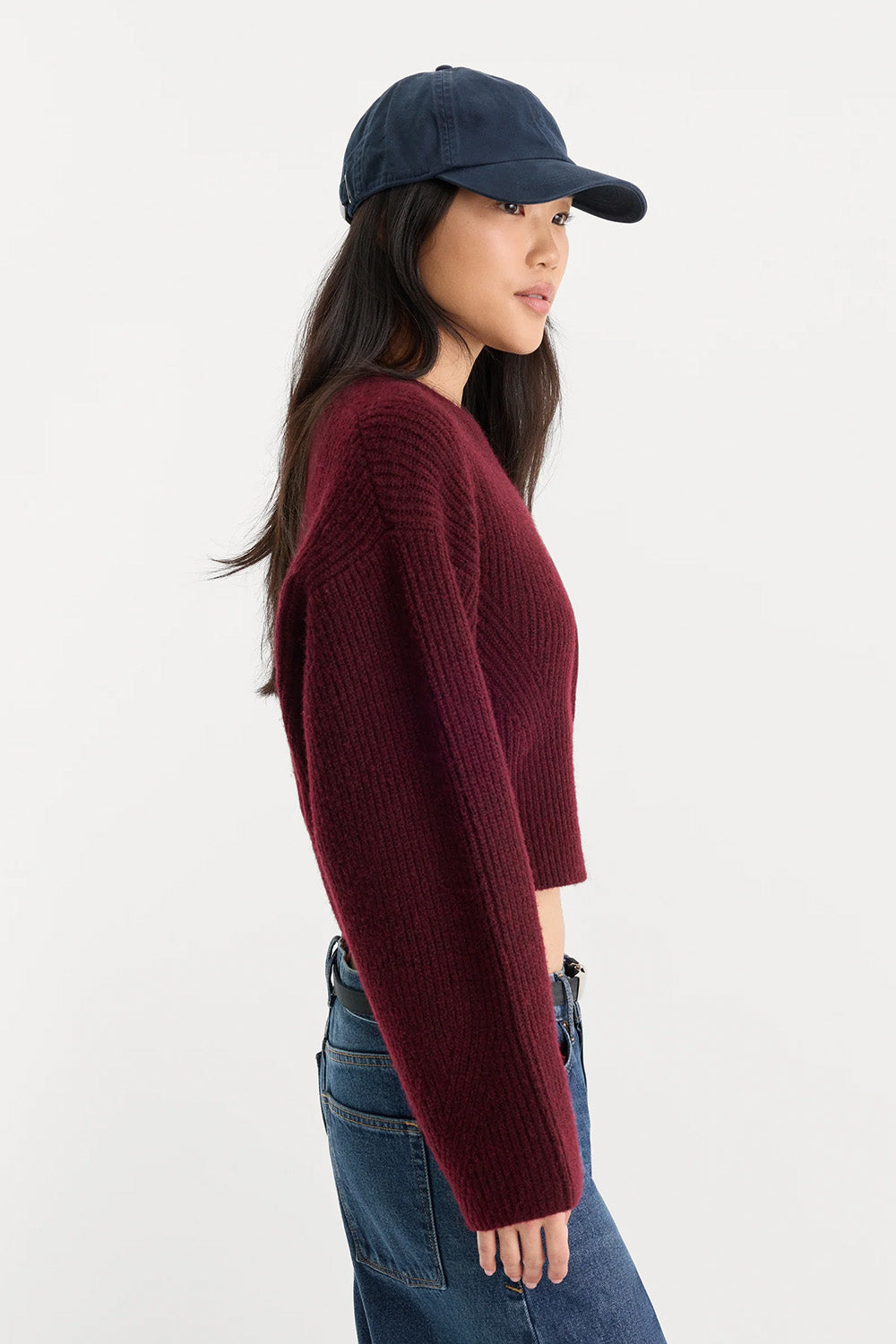 Good American The Chunky Knit Sweater in Berry Noir — Side view
