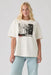 Levi's Graphic Tabor Tee in Moody Vase Egret — Front view, hand at side