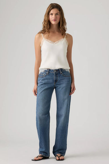 Levi's Low Straight in Real Recognize Real — Front view, hands in pockets