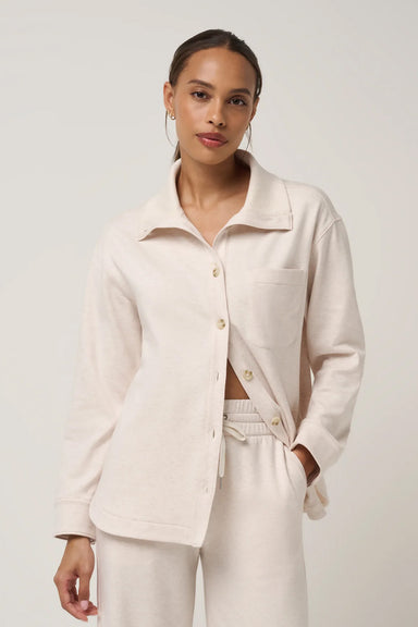 Travis Mathew Cloud Fleece Button Down in Heather Brazillian Sand — Front view