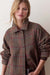 Marine Layer Hayes Houndstooth Trench in Neutral Mini Herringbone — Front view, collar detail