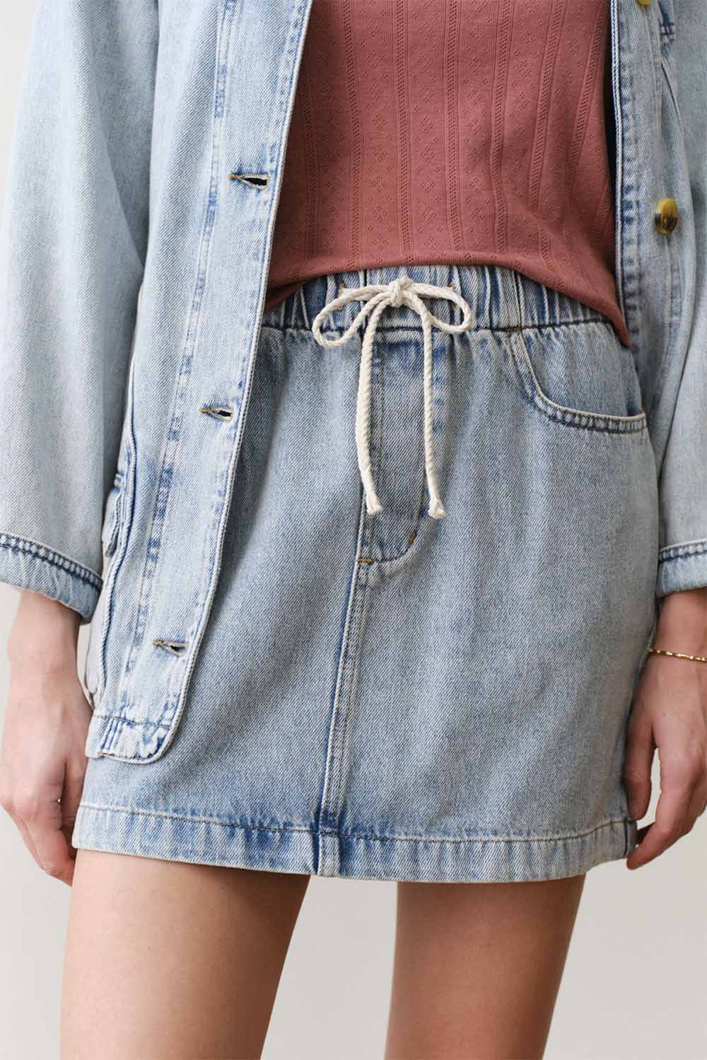 marine layer ella denim mini skirt light wash front