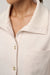 Travis Mathew Cloud Fleece Button Down in Heather Brazillian Sand — Collar detail view