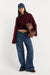 Good American The Chunky Knit Sweater in Berry Noir — Styled view