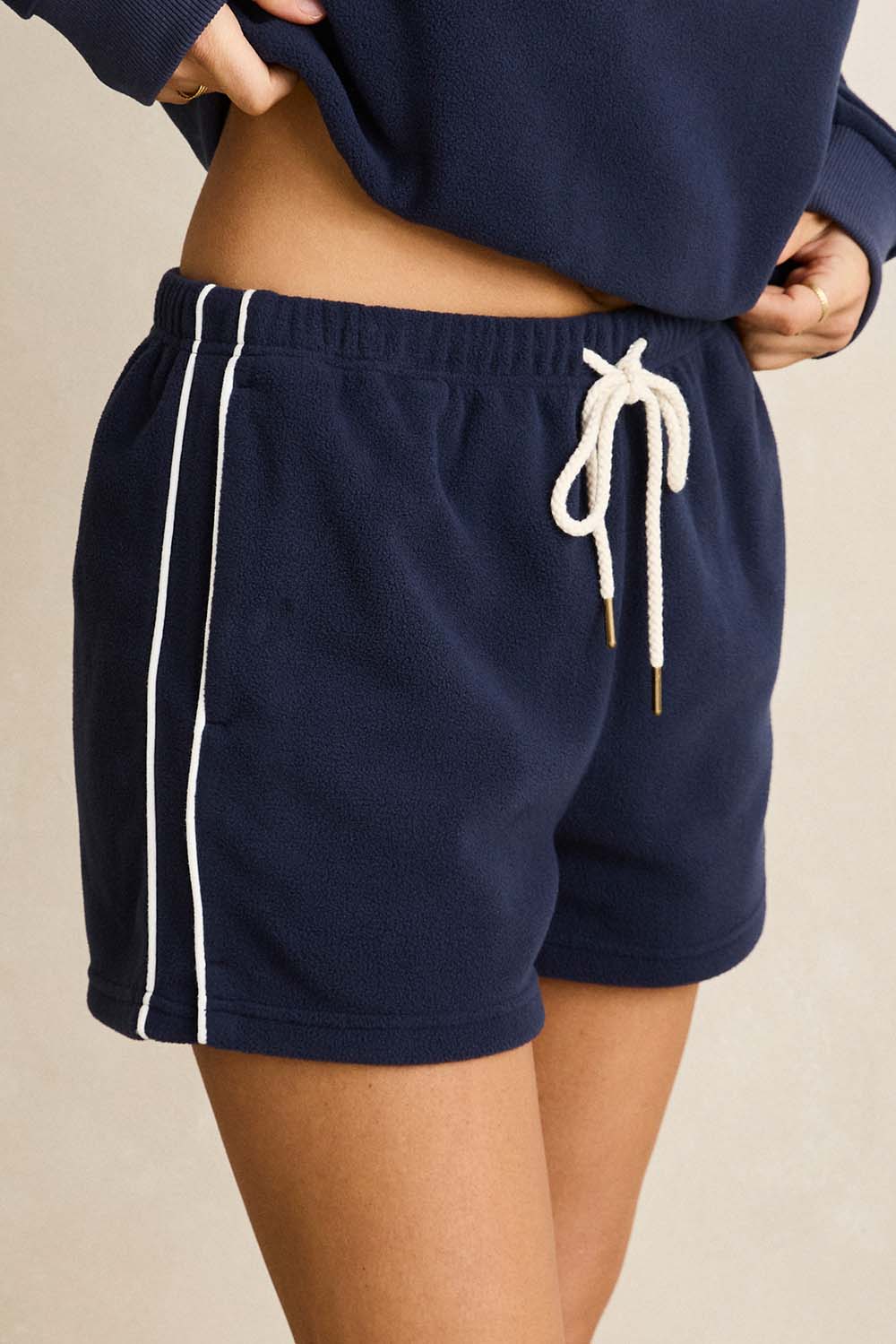 Rhythm Pipe Polar Fleece Short in Ocean — Piping detail view