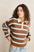 Rhythm Rugby Polo Knit Sweater in Brown — Front view, hands on hips