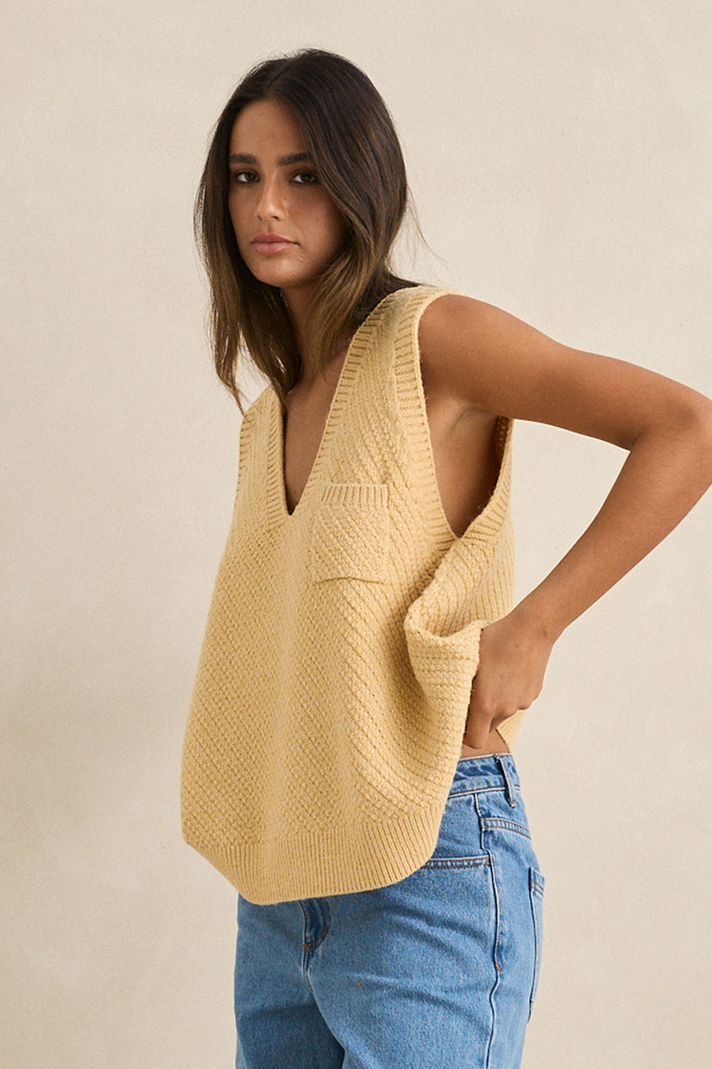 rhythm archer knit vest sand side