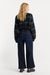 Good American Soft Tech Waist Palazzo Ankle Jeans in Rinse — Back view