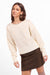 Sage the Label Bookshop Sweater in Cream Oak — Quarter view, hand at hip