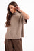 Sage the Label Granger Sweater Vest in Taupe — Quarter view, hand at ear