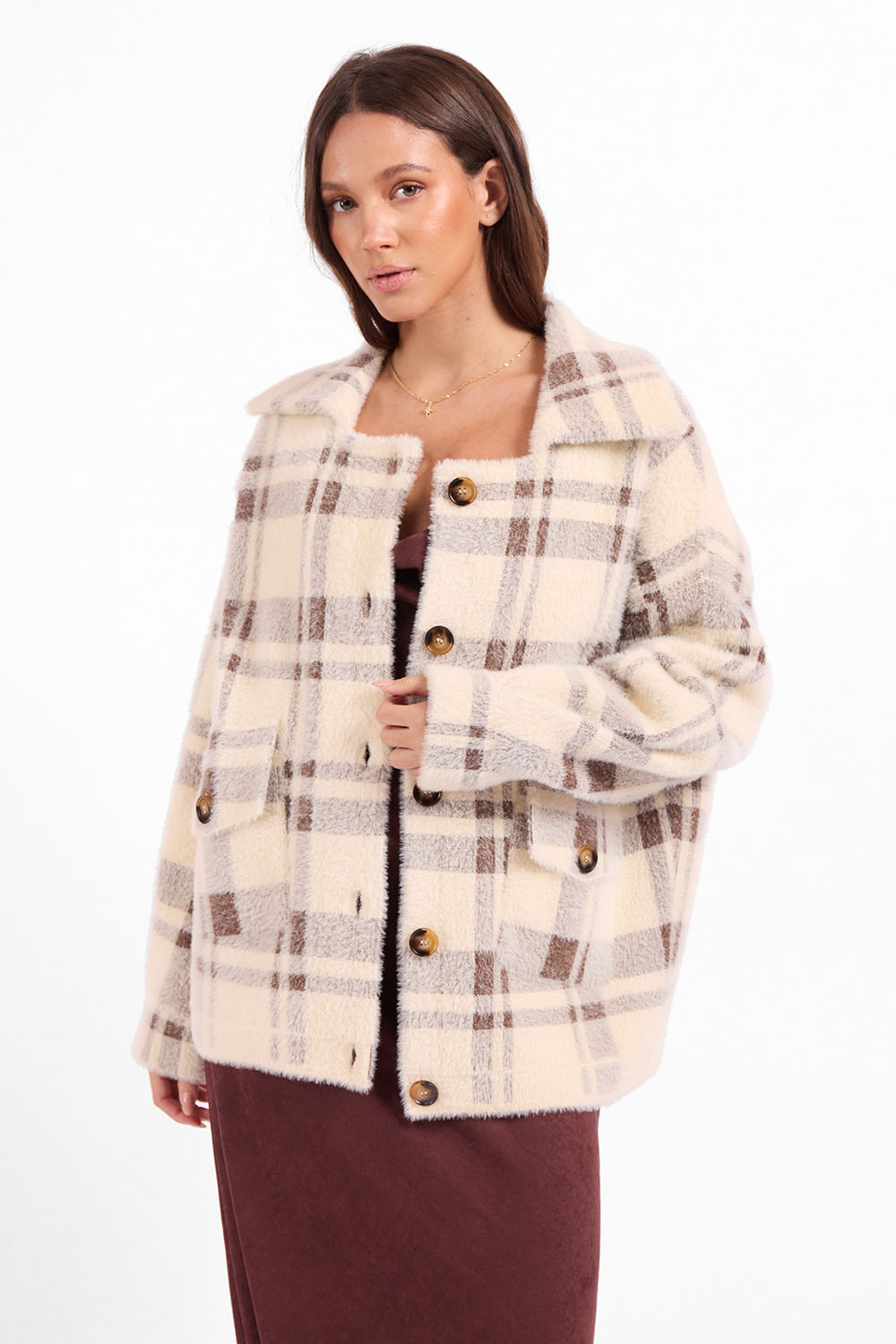 Sage the Label Lola Plaid Sweater Jacket in Cream Brown — Front view, hand at button