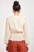 Sage the Label Monaco Peplum Top in Cream — Back view