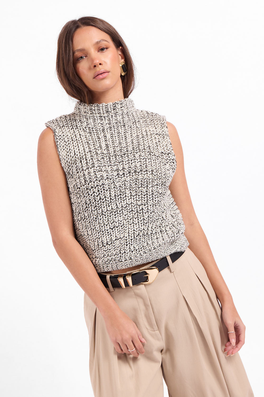 Sage the Label Williams Sleeveless Sweater in Ivory Black — Front view, hands at waist