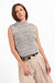 Sage the Label Williams Sleeveless Sweater in Ivory Black — Front view, hands at waist