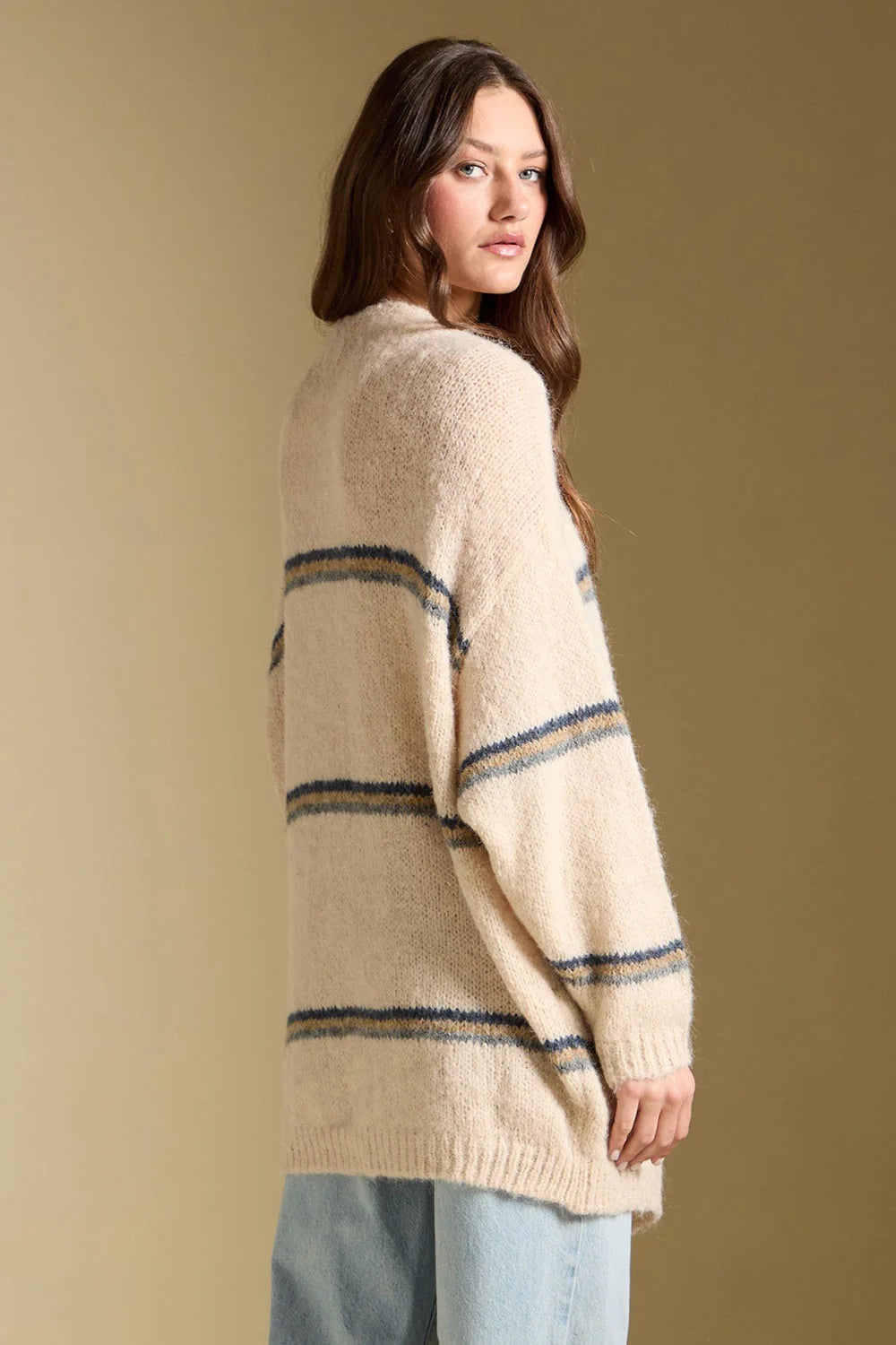 Birdy Sweater in Natural — Back view, looking over shoulder