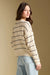Hadlee Sweater in Natural — Back view, looking over shoulder