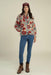 Sendero Sedona Fleece in Desert Floral Rosado — Full-body view, styled