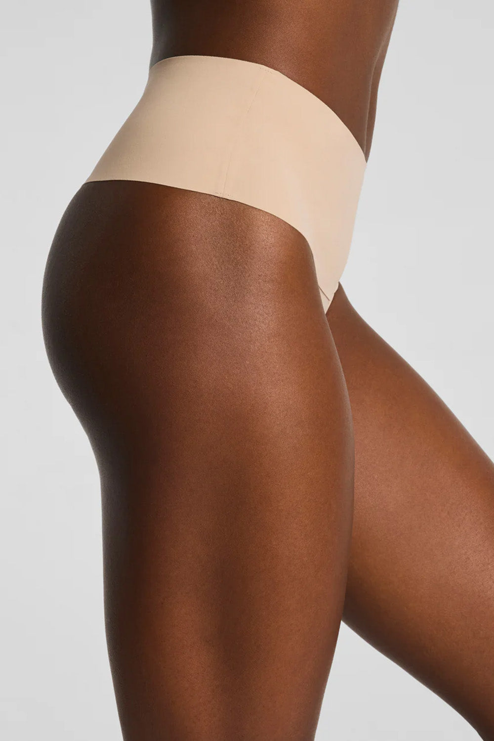spanx undie-tecable thong in chai side view