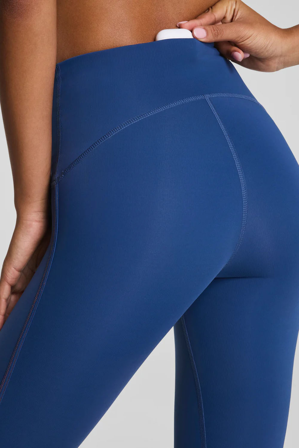 spanx booty boost staycool tech leggings faded indigo detail