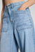 spanx utility barrel leg jeans seaside blue detail