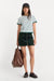 Good American The Cord Mini Skirt in Forest Green — Front view