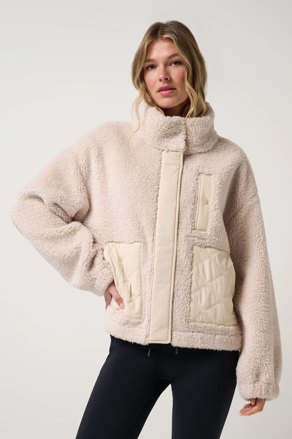travis mathew clubside sherpa jacket brazilian sand front