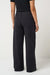 Travis Mathew Everyday Patch Pocket Twill Pant in Black — Back view
