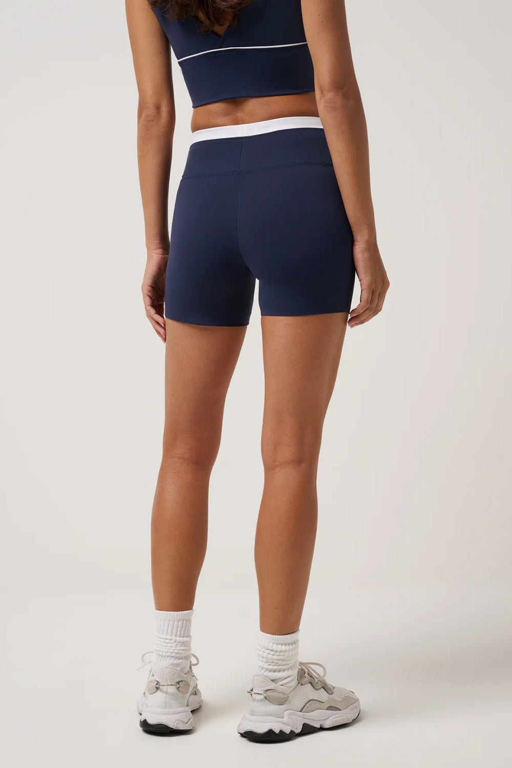 travis-mathew-moveknit-bonded-short-navy-blazer-back