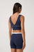 travis-mathew-moveknit-vneck-bra-top-navy-blazer-back