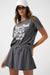 Travis Mathew Relaxed Boxy Tee in Blackened Pearl — Front view, styled with cap and sunglasses