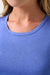 travis-mathew-skyline-jersey-tank-heather-baja-blue-detail