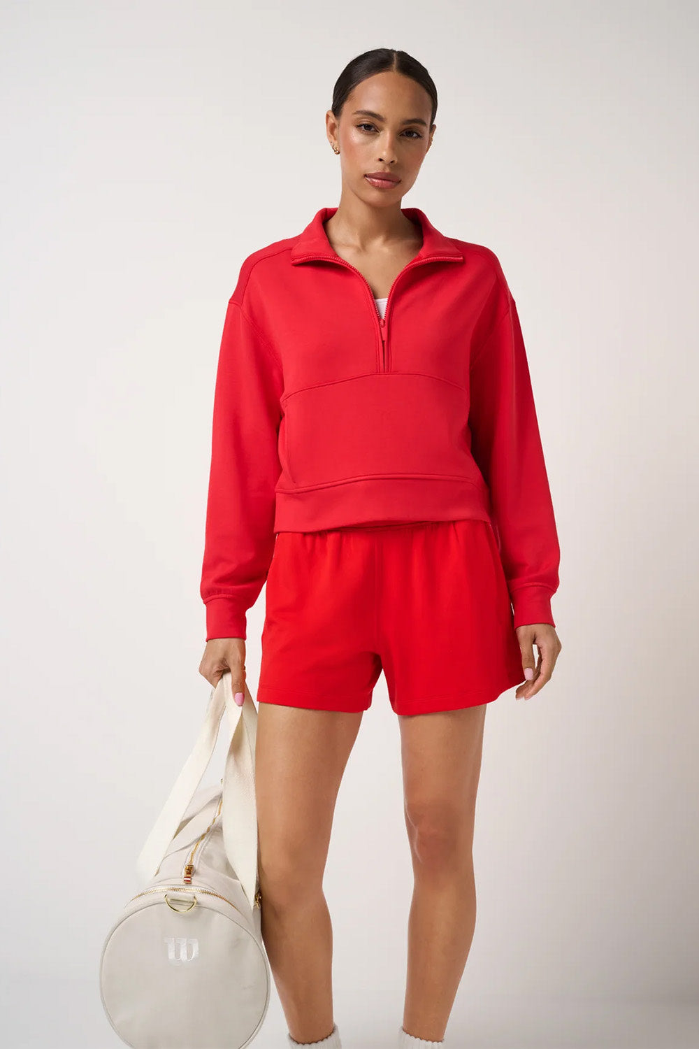 Travis Mathew Skyloft Soft 1/2 Zip 2.0 in Tomato — Full-body view
