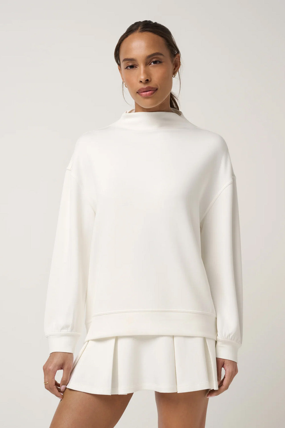 Travis Mathew Skyloft Soft Funnel Neck in Snow White — Front view