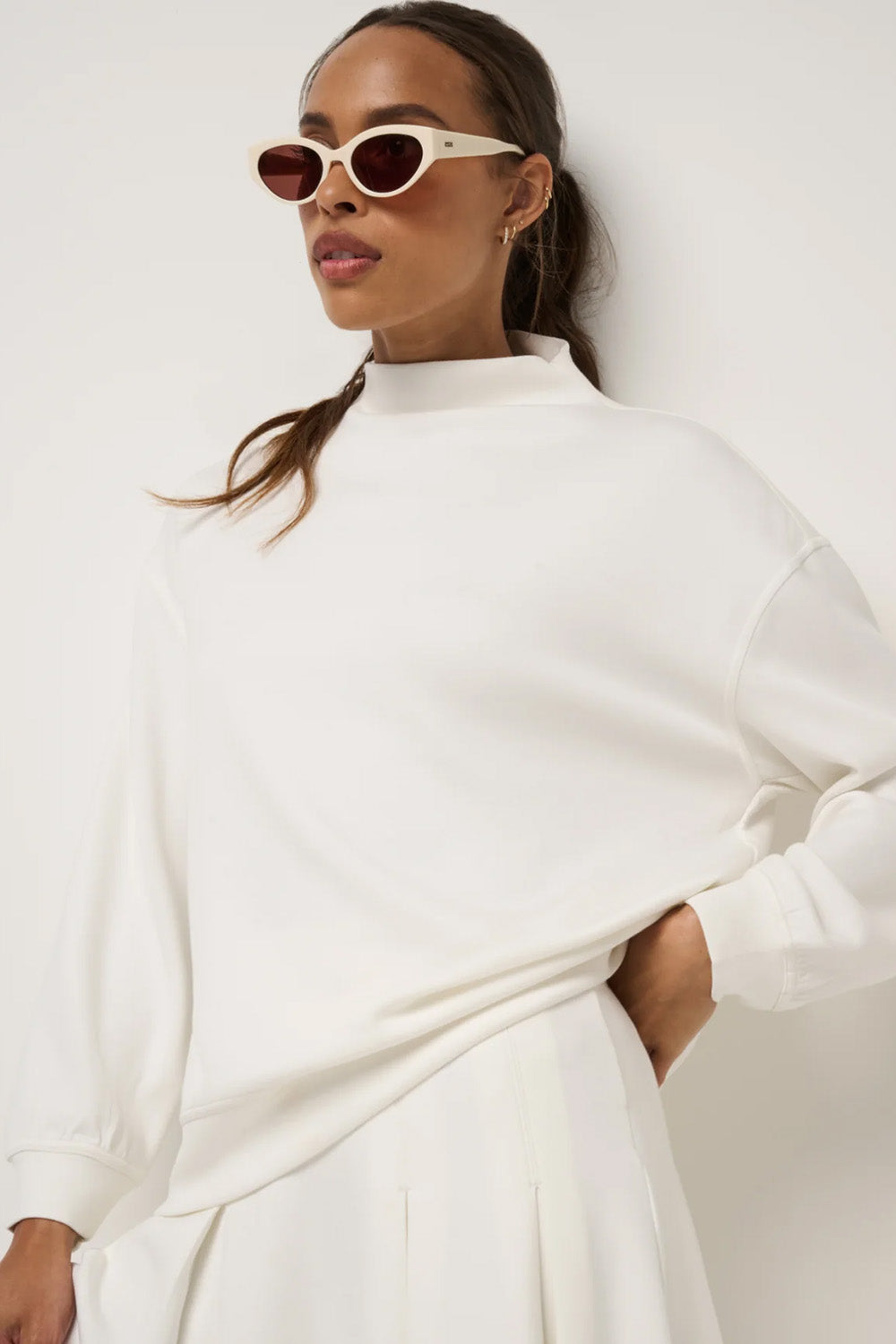 Travis Mathew Skyloft Soft Funnel Neck in Snow White — Full-body view