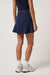 travis mathew skyloft soft aline skort navy blazer back